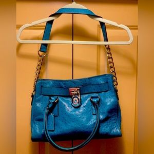 Turquoise leather blue ostrich Michael Kors bag. 13x5x9
